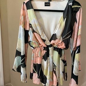 Floral “deep v” Romper